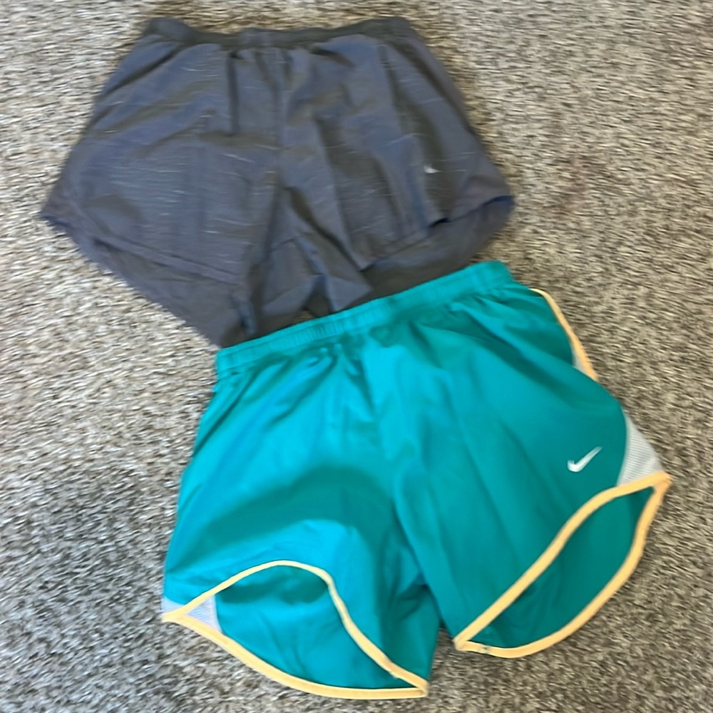 gray and light blue ish green nike shorts both were 32 $64 TOTAL